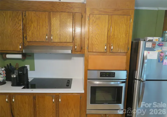 Photo 3 of Single family home for sale at 419 S Church St, Lowell, NC 28098 | MLS# 4370437 | Listing updated on 2026-09-22