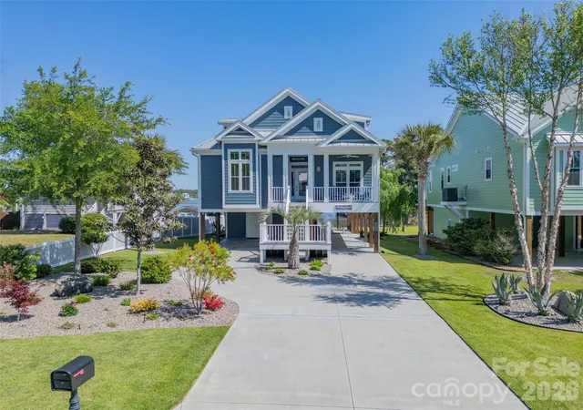 Photo 1 of Single family home for sale at 6308 E Yacht Dr, Oak Island, NC 28465 | MLS# 4373324 | Listing updated on 2026-08-29