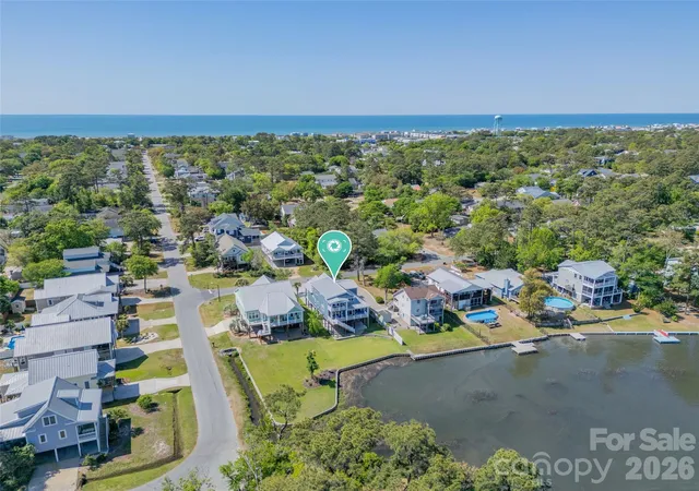 Photo 2 of Single family home for sale at 6308 E Yacht Dr, Oak Island, NC 28465 | MLS# 4373324 | Listing updated on 2026-08-29