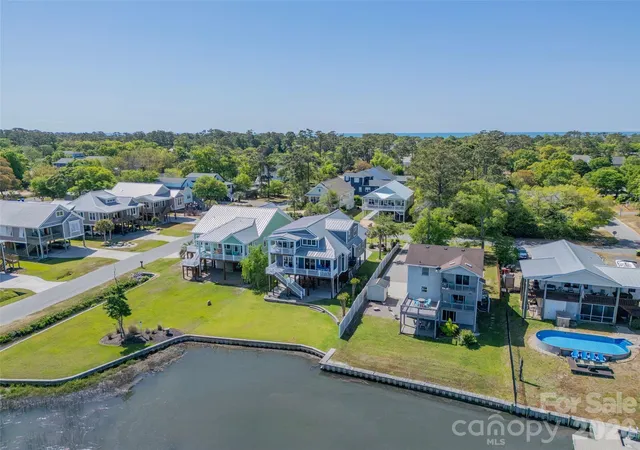 Photo 3 of Single family home for sale at 6308 E Yacht Dr, Oak Island, NC 28465 | MLS# 4373324 | Listing updated on 2026-08-29