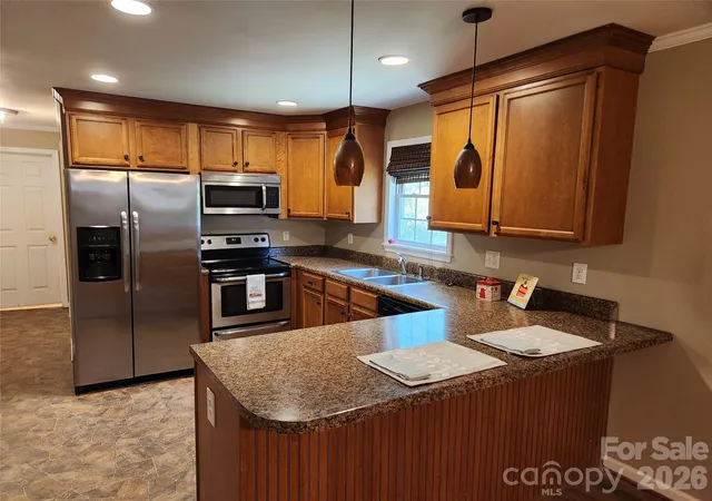Photo 3 of Single family home for sale at 1404 W Mauney Ave, Gastonia, NC 28052 | MLS# 4374899 | Listing updated on 2026-05-01