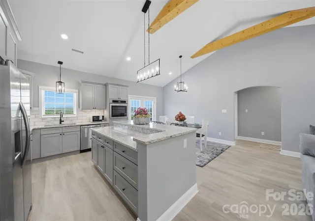 Photo 3 of Single family home for sale at 418 Huntington Woods St SE, Lenoir, NC 28645 | MLS# 4377104 | Listing updated on 2026-09-19