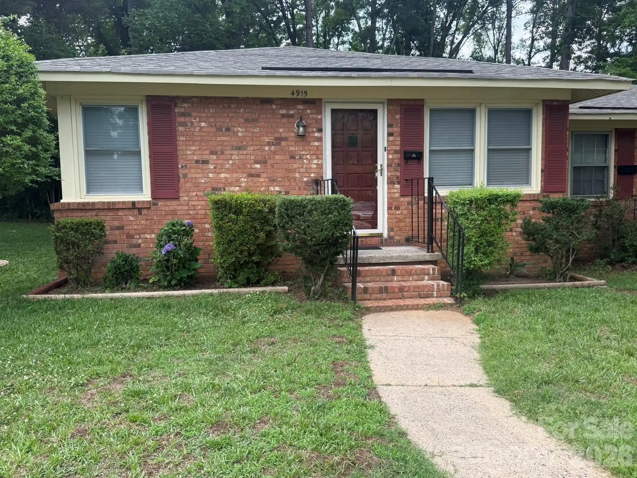 Listing Photo 1 - Condo for sale in 4915 Malibu Dr located at 4915 Malibu Dr, Charlotte, NC 28215 - Unit 4915 Malibu Dr