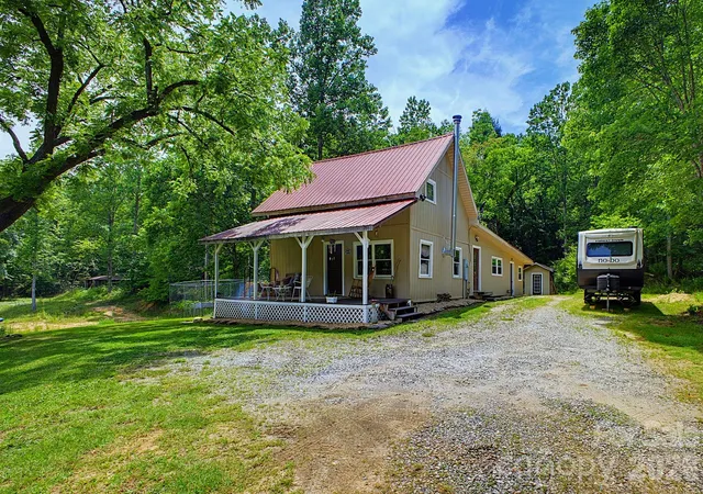 Photo 3 of Single family home for sale at 1239 W Mcguinn Rd, Mill Spring, NC 28756 | MLS# 4387532 | Listing updated on 2026-10-21