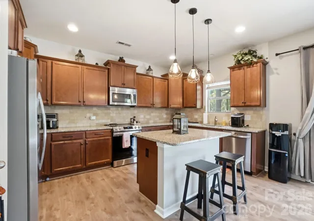 Photo 4 of Single family home for sale at 1231 Tranquil Fls Ln, Matthews, NC 28104 | MLS# 4390009 | Listing updated on 2026-10-03