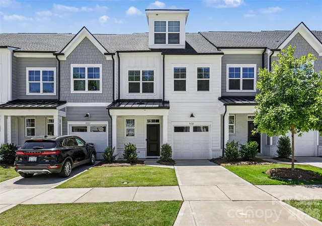 Photo 1 of Townhouse for sale at 9521 Munsing Dr, Charlotte, NC 28269 | MLS# 4390189 | Listing updated on 2026-09-17