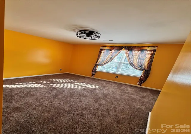 Listing Photo 2 - Condo for sale in building located at 3055 Nevin Pl Dr, Charlotte, NC 28269 - Unit #