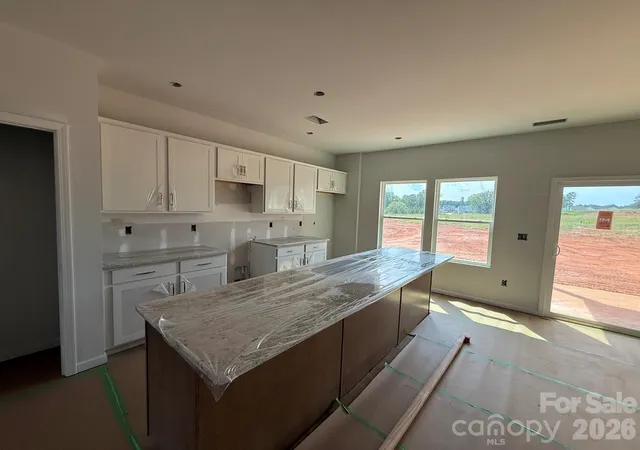 Photo 3 of Single family home for sale at 4021 Juno Dr, Charlotte, NC 28215 | MLS# 4392670 | Listing updated on 2026-09-28