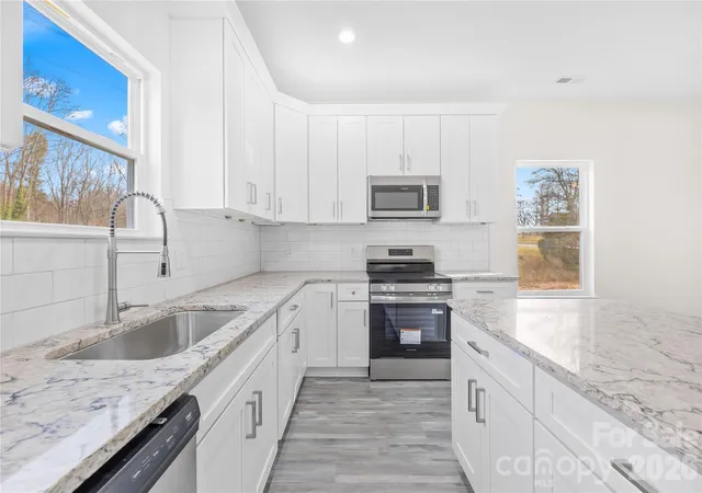 Photo 3 of Single family home for sale at 115 S Railroad Ave, East Spencer, NC 28039 | MLS# 4394930 | Listing updated on 2026-09-26