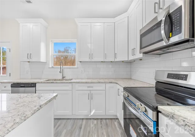 Photo 3 of Single family home for sale at 115 S Railroad Ave, East Spencer, NC 28039 | MLS# 4394930 | Listing updated on 2026-09-26
