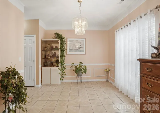 Photo 3 of Single family home for sale at 5619 Hedgecrest Pl, Charlotte, NC 28269 | MLS# 4396327 | Listing updated on 2026-09-04