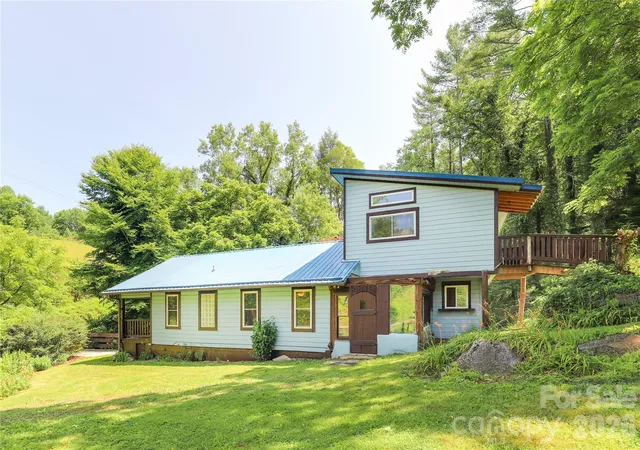 Photo 3 of Single family home for sale at 435 Mountain Cvs Rd, Marshall, NC 28753 | MLS# 4396478 | Listing updated on 2026-08-28