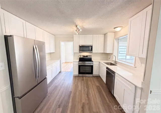 Photo 3 of Single family home for sale at 11932 Idlewild Rd, Matthews, NC 28105 | MLS# 4397057 | Listing updated on 2026-09-24