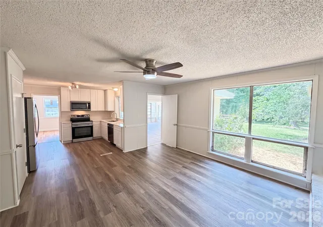 Photo 4 of Single family home for sale at 11932 Idlewild Rd, Matthews, NC 28105 | MLS# 4397057 | Listing updated on 2026-09-24