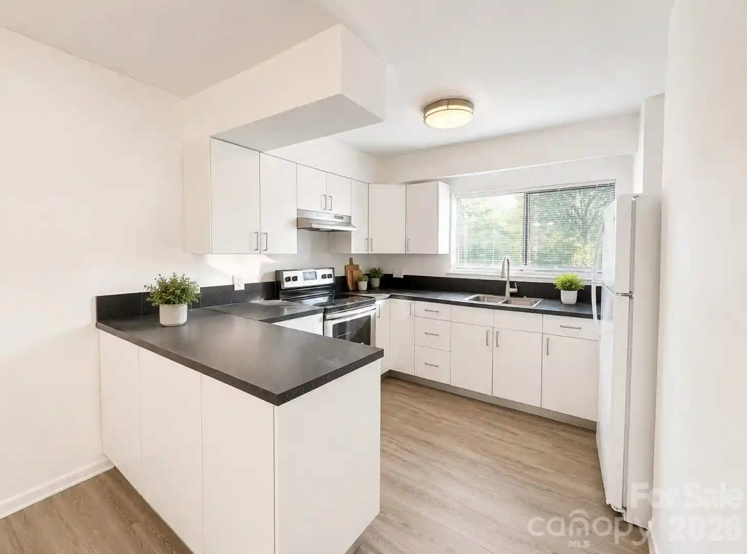 Listing Photo 1 - Condo for sale in 4822 Spring Lake Dr located at 4822 Spring Lake Dr, Charlotte, NC 28212 - Unit 4822 Spring Lake Dr