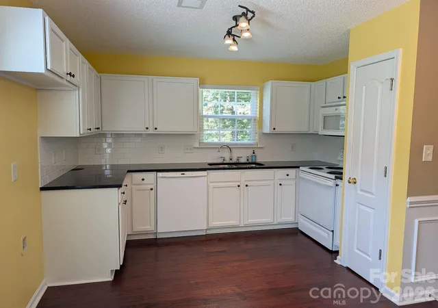 Photo 4 of Single family home for sale at 704 Gum Branch Rd, Charlotte, NC 28214 | MLS# 4397567 | Listing updated on 2026-09-21