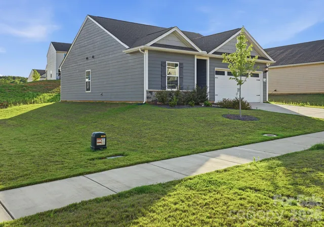 Photo 2 of Single family home for sale at 116 S Sina St, Troutman, NC 28166 | MLS# 4398210 | Listing updated on 2026-10-01
