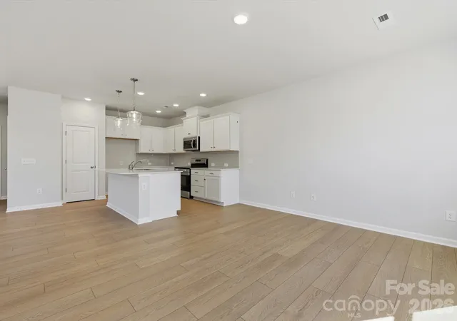 Photo 2 of Townhouse for sale at 6067 White Aster Ln, Charlotte, NC 28216 | MLS# 4398357 | Listing updated on 2026-10-26