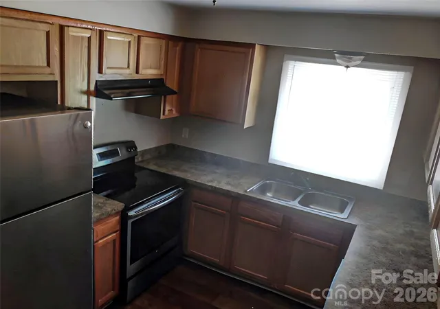 Photo 4 of Single family home for sale at 6311 Coach Hl Ln, Charlotte, NC 28212 | MLS# 4398478 | Listing updated on 2026-09-22