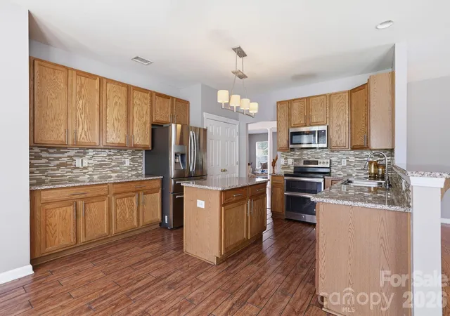Photo 4 of Single family home for sale at 5214 Coffeeberry Ln, Charlotte, NC 28227 | MLS# 4398838 | Listing updated on 2026-08-31