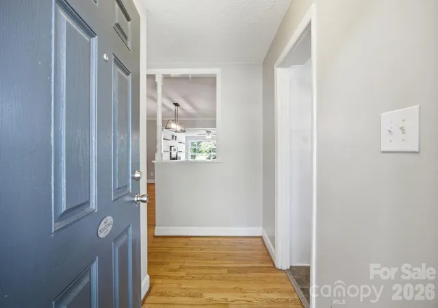 Photo 3 of Single family home for sale at 1401 Grovewood Dr, Charlotte, NC 28208 | MLS# 4398914 | Listing updated on 2026-09-04