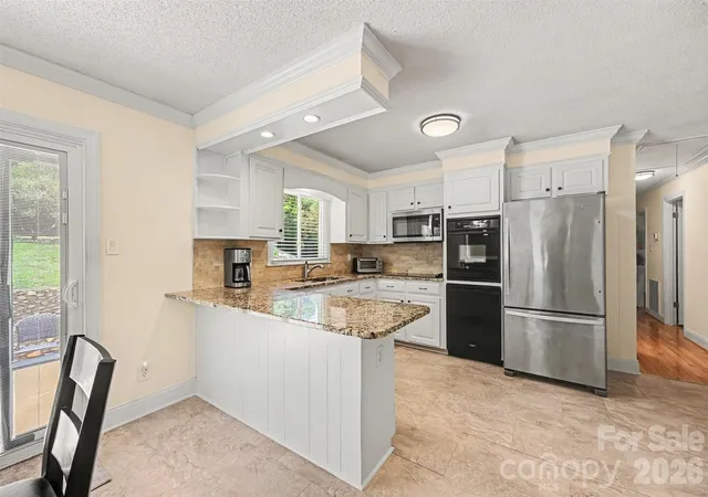 Photo 4 of Single family home for sale at 9050 Miriam Dr, Huntersville, NC 28078 | MLS# 4399453 | Listing updated on 2026-09-30