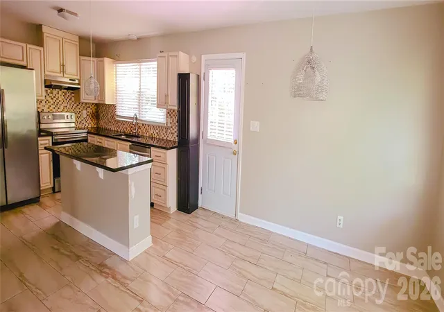 Photo 4 of Single family home for sale at 6315 Spring Garden Ln, Charlotte, NC 28213 | MLS# 4399820 | Listing updated on 2026-07-07