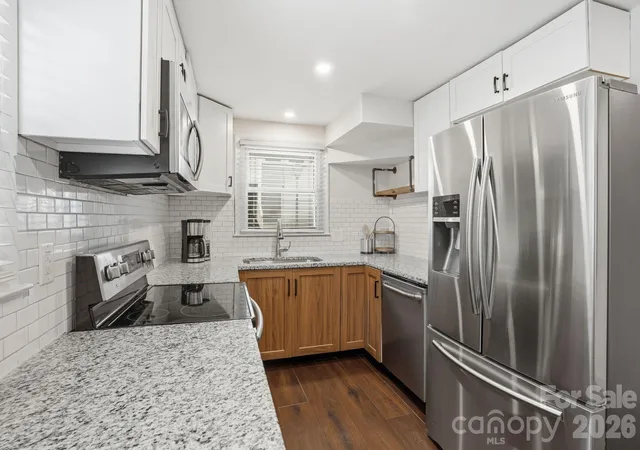 Photo 1 of Condo for sale at 721 N Poplar St #1, Charlotte, NC 28202 | MLS# 4399856 | Listing updated on 2026-10-03