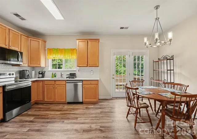 Photo 4 of Townhouse for sale at 9866 Treeside Ln, Matthews, NC 28105 | MLS# 4400724 | Listing updated on 2026-10-03
