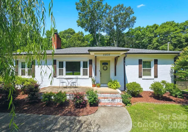 Photo 3 of Single family home for sale at 6409 Woodland Cir, Charlotte, NC 28216 | MLS# 4401074 | Listing updated on 2026-08-03