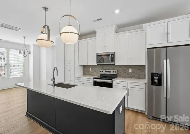 Photo 2 of Townhouse for sale at 1139 Kokomo Ln, Charlotte, NC 28206 | MLS# 4403154 | Listing updated on 2026-10-04