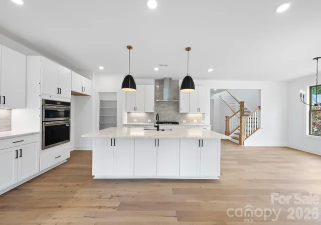 Photo 3 of Single family home for sale at 1124 Berryhill Rd, Charlotte, NC 28208 | MLS# 4403882 | Listing updated on 2026-09-28