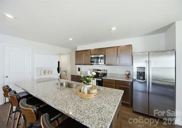Photo 3 of Single family home for sale at 1705 Gutter Branch Dr, Charlotte, NC 28216 | MLS# 4404002 | Listing updated on 2026-08-26