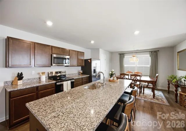 Photo 3 of Single family home for sale at 1705 Gutter Branch Dr, Charlotte, NC 28216 | MLS# 4404002 | Listing updated on 2026-08-26