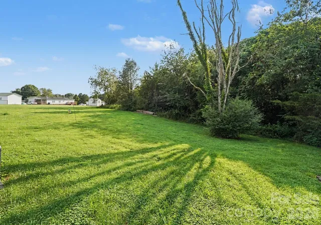 Photo 2 of Single family home for sale at 115 Greenmont Dr, Stony Point, NC 28678 | MLS# 4404395 | Listing updated on 2026-08-13
