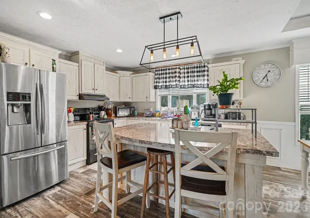 Photo 5 of Single family home for sale at 115 Greenmont Dr, Stony Point, NC 28678 | MLS# 4404395 | Listing updated on 2026-08-13