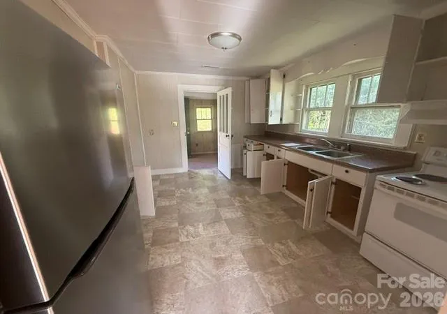 Photo 4 of Single family home for sale at 307 Yancey St, Marion, NC 28752 | MLS# 4405596 | Listing updated on 2026-07-20