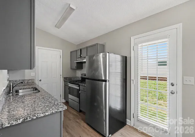 Photo 4 of Single family home for sale at 7035 Red Bud Cir, Charlotte, NC 28214 | MLS# 4406173 | Listing updated on 2026-08-20