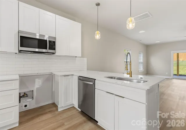 Photo 4 of Townhouse for sale at 709 Pennsylvania Ave, Charlotte, NC 28216 | MLS# 4406385 | Listing updated on 2026-08-09