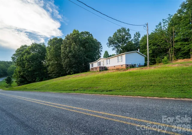 Photo 3 of Single family home for sale at 479 Mcdade Rd, Tryon, NC 28782 | MLS# 4406506 | Listing updated on 2026-10-04