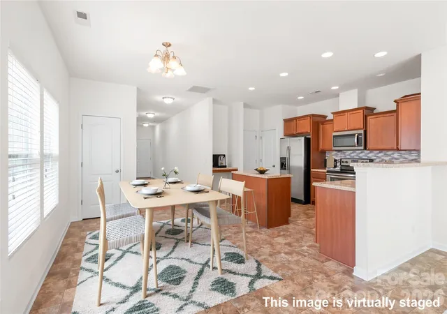 Photo 3 of Single family home for sale at 8411 Romana Red Ln, Charlotte, NC 28213 | MLS# 4406606 | Listing updated on 2026-10-06