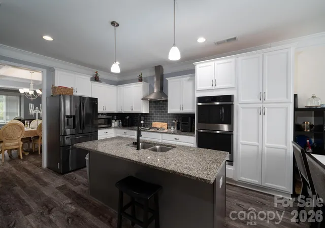 Photo 4 of Single family home for sale at 955 Robinson Rd, Gastonia, NC 28056 | MLS# 4407272 | Listing updated on 2026-09-25