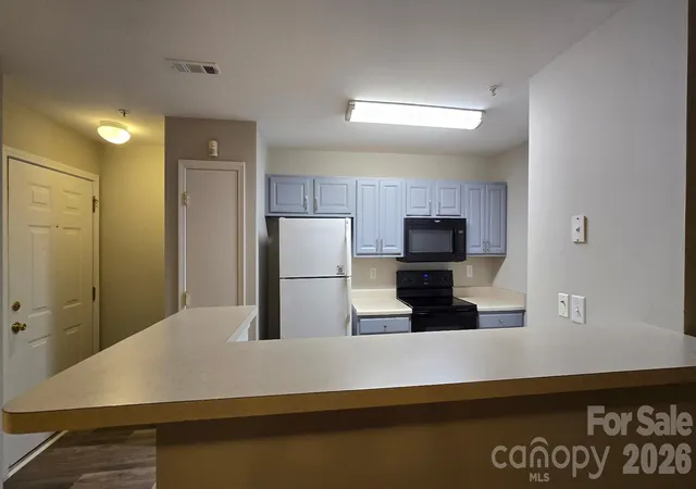 Photo 2 of Condo for sale at 9811 Campus Walk Ln #C, Charlotte, NC 28262 | MLS# 4407436 | Listing updated on 2026-08-05