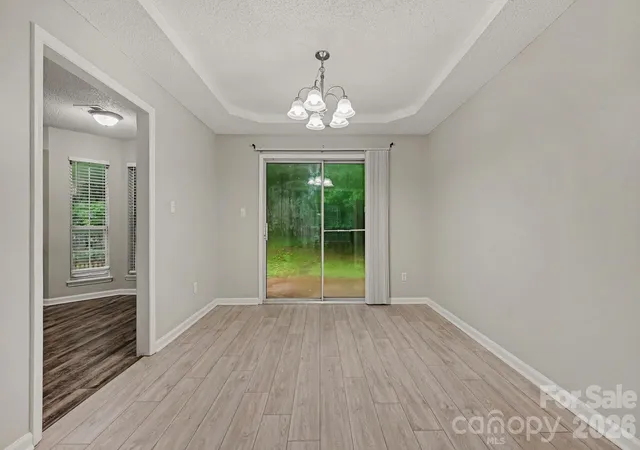 Photo 4 of Single family home for sale at 8722 Woodhill Manor Ct, Charlotte, NC 28215 | MLS# 4407468 | Listing updated on 2026-09-22