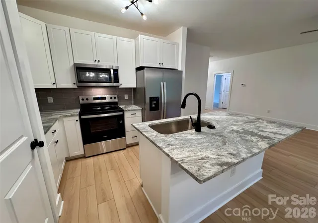 Photo 3 of Single family home for sale at 1010 John St #4, Monroe, NC 28110 | MLS# 4407779 | Listing updated on 2026-09-08