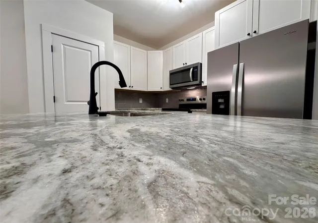Photo 3 of Single family home for sale at 1010 John St #4, Monroe, NC 28110 | MLS# 4407779 | Listing updated on 2026-09-08