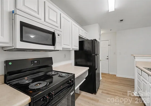 Listing Photo 1 - Condo for sale in building located at 9849 Campus Walk Ln, Charlotte, NC 28262 - Unit #D