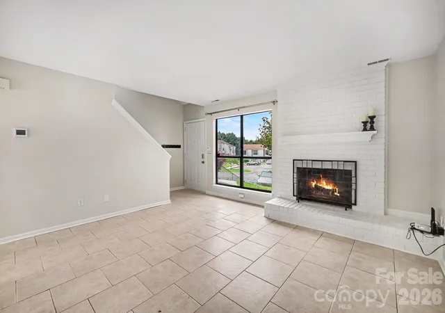 Photo 2 of Townhouse for sale at 11009 Carmel Xing Rd, Charlotte, NC 28226 | MLS# 4408434 | Listing updated on 2026-10-17
