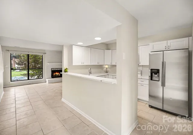Photo 4 of Townhouse for sale at 11009 Carmel Xing Rd, Charlotte, NC 28226 | MLS# 4408434 | Listing updated on 2026-10-17