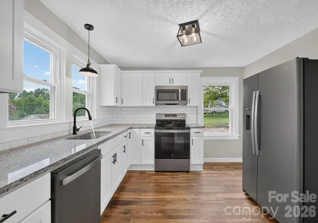 Photo 3 of Single family home for sale at 410 Spruce St SW, Lenoir, NC 28645 | MLS# 4410163 | Listing updated on 2026-09-03
